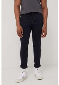 PRODUKT by Jack & Jones - Produkt by Jack & Jones spodnie męskie kolor granatowy gładkie. Kolor: niebieski. Materiał: dzianina. Wzór: gładki