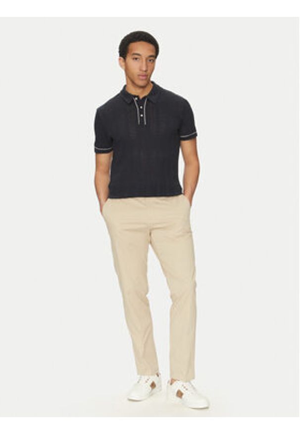Marciano Guess Polo 5GHP07 6321A Granatowy Regular Fit. Typ kołnierza: polo. Kolor: niebieski. Materiał: bawełna