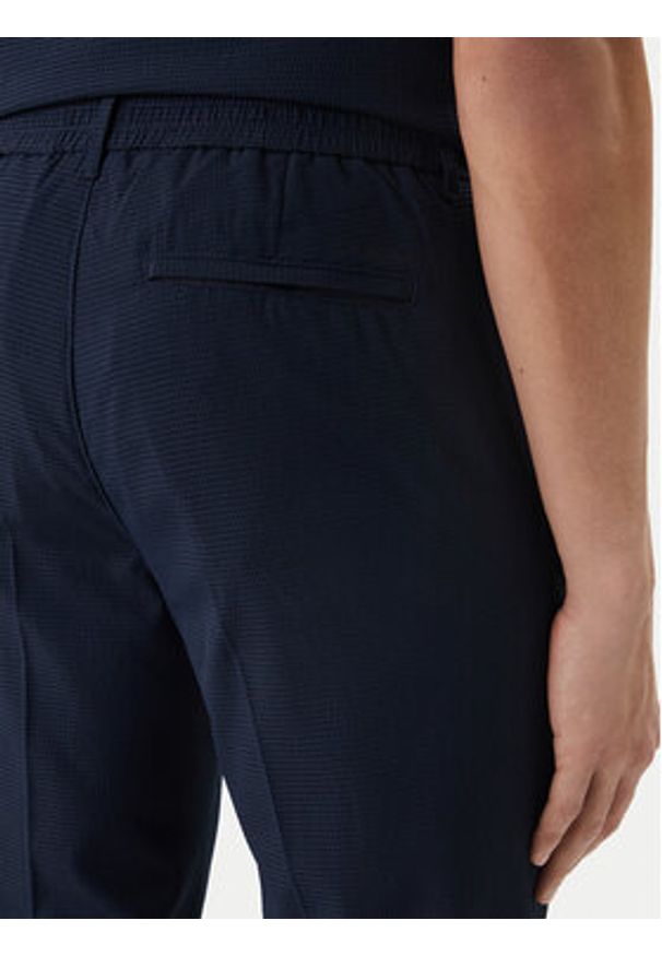 Calvin Klein Spodnie materiałowe LV04LF609G Granatowy Straight Fit. Kolor: niebieski. Materiał: syntetyk