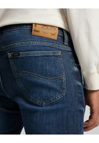 Lee - LEE RIDER MĘSKIE SPODNIE JEANSOWE SEA SALT WORN L701PXEI 112321982