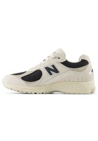 Buty unisex New Balance U2002RN – beżowe. Kolor: beżowy. Materiał: zamsz, guma. Szerokość cholewki: normalna #6