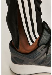adidas Performance - Spodnie. Kolor: czarny. Materiał: poliester, dzianina. Wzór: nadruk #4