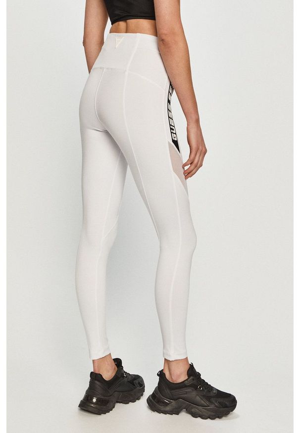 Guess - Legginsy. Stan: podwyższony. Kolor: biały. Wzór: nadruk