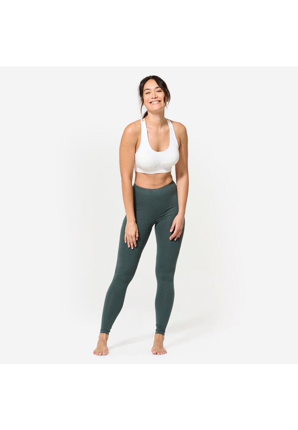 Decathlon - Stanik sportowy Kimjaly. Kolor: biały. Materiał: materiał, poliamid, skóra, elastan. Rodzaj stanika: wyciągane miseczki. Sport: joga i pilates