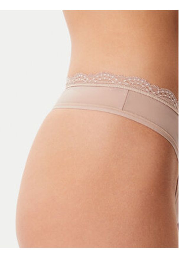 Calvin Klein Underwear Stringi LV00QD5270 Beżowy. Kolor: beżowy. Materiał: syntetyk