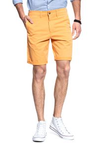 Wrangler - SPODENKI MĘSKIE WRANGLER CHINO SHORT AMBER YELLOW W14AMM15V. Materiał: materiał. Wzór: jednolity, aplikacja