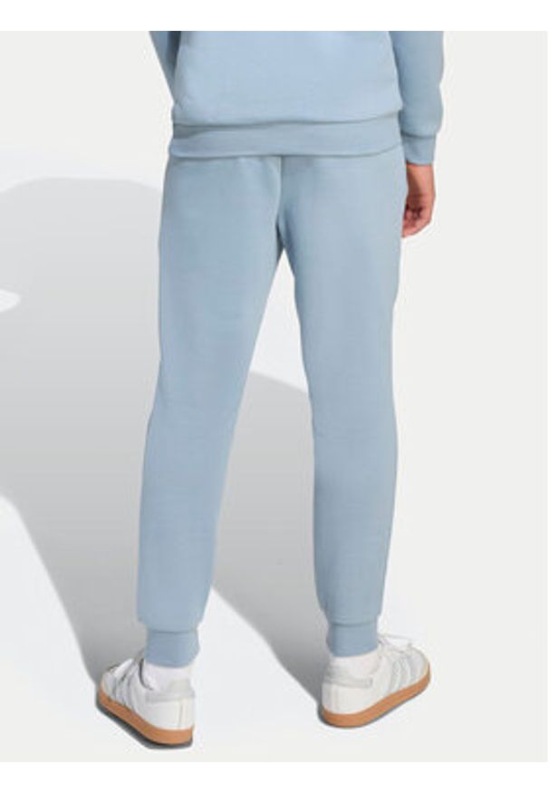 Adidas - adidas Spodnie dresowe JX2743 Błękitny Regular Fit. Kolor: niebieski. Materiał: bawełna