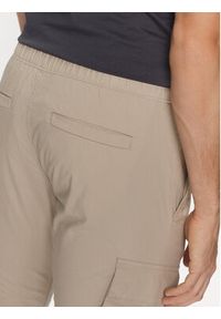 Calvin Klein Jeans Joggery J30J327614 Beżowy Skinny Fit. Kolor: beżowy. Materiał: bawełna