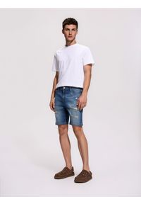 Reserved - Jeansowe szorty z przetarciami - indigo jeans. Materiał: jeans