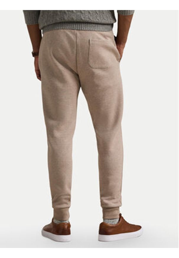 Polo Ralph Lauren Spodnie dresowe 710881518046 Beżowy Regular Fit. Kolor: beżowy. Materiał: syntetyk