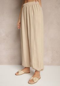 Renee - Beżowe Spodnie Joggery High Waist ze Ściągaczami Korilanea. Okazja: na co dzień. Stan: podwyższony. Kolor: beżowy. Styl: casual, elegancki