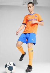 Puma - Męskie szorty Olympique Marsylia 24/25 PUMA Racing Blue Fluro Orange Pes. Kolor: żółty, pomarańczowy, wielokolorowy, niebieski. Sport: piłka nożna