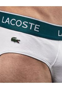 Lacoste - LACOSTE - Zestaw 3 par białych slipów z logo. Kolor: biały. Materiał: bawełna #4