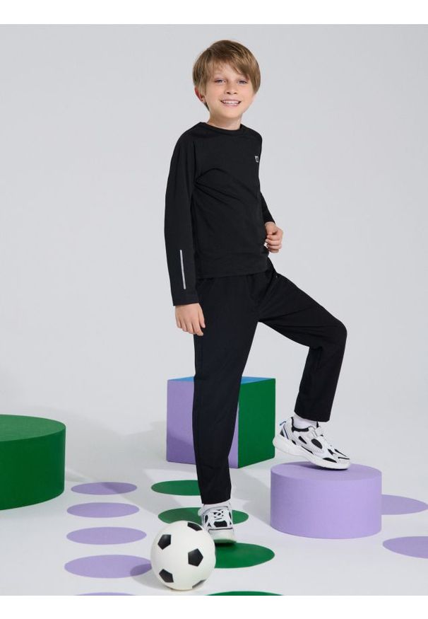 Sinsay - Spodnie sportowe Active - czarny. Kolor: czarny. Styl: sportowy