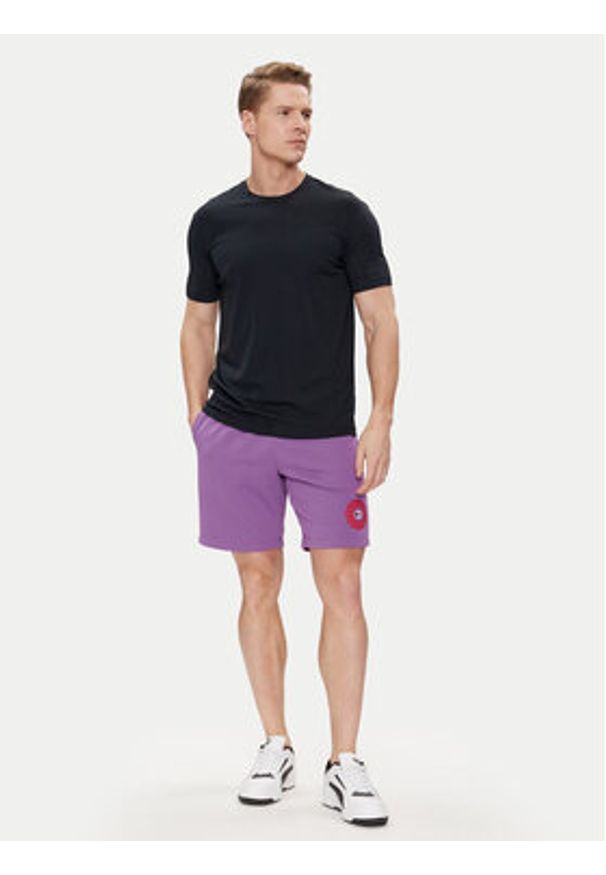 Champion Szorty sportowe 219850 Fioletowy Comfort Fit. Kolor: fioletowy. Materiał: bawełna, syntetyk. Styl: sportowy