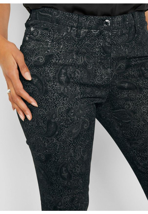 bonprix - Spodnie z diagonalu z efektownym nadrukiem. Kolor: czarny. Wzór: nadruk. Styl: elegancki, klasyczny