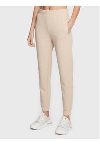 Calvin Klein Spodnie dresowe Micro Logo Essential K20K204424 Beżowy Regular Fit. Kolor: beżowy. Materiał: bawełna, dresówka #1