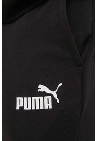 Puma spodnie męskie kolor czarny z nadrukiem. Kolor: czarny. Materiał: materiał, dzianina. Wzór: nadruk