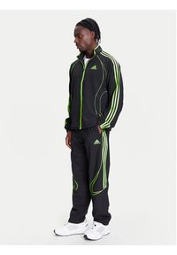 Adidas - adidas Spodnie dresowe Teamgeist adicolor JW5869 Czarny Loose Fit. Kolor: czarny. Materiał: syntetyk #3