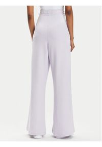 Tommy Jeans Spodnie dresowe DW0DW17312 Fioletowy Wide Leg. Kolor: fioletowy. Materiał: wiskoza
