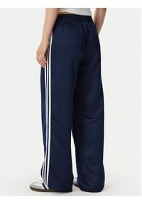 Adidas - adidas Spodnie dresowe Satin Sst Loose Trackpant KS7339 Granatowy Relaxed Fit. Kolor: niebieski. Materiał: syntetyk #3