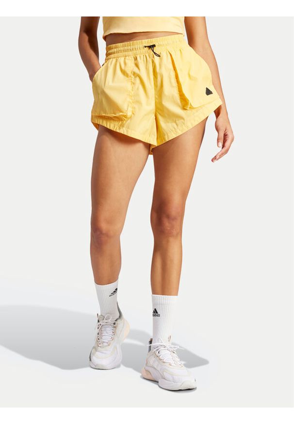 Adidas - adidas Szorty sportowe City Escape Summer IS0662 Żółty Loose Fit. Kolor: żółty. Materiał: syntetyk