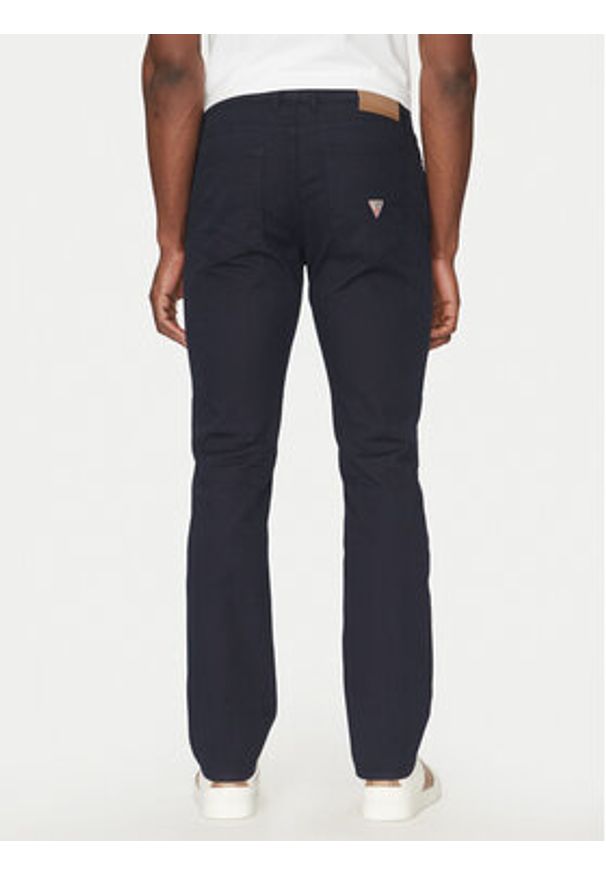 Guess Spodnie materiałowe M5RAS2WGXW1 Granatowy Regular Fit. Kolor: niebieski. Materiał: bawełna