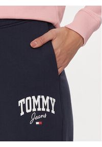 Tommy Jeans Spodnie dresowe DW0DW16379 Granatowy Relaxed Fit. Kolor: niebieski. Materiał: bawełna