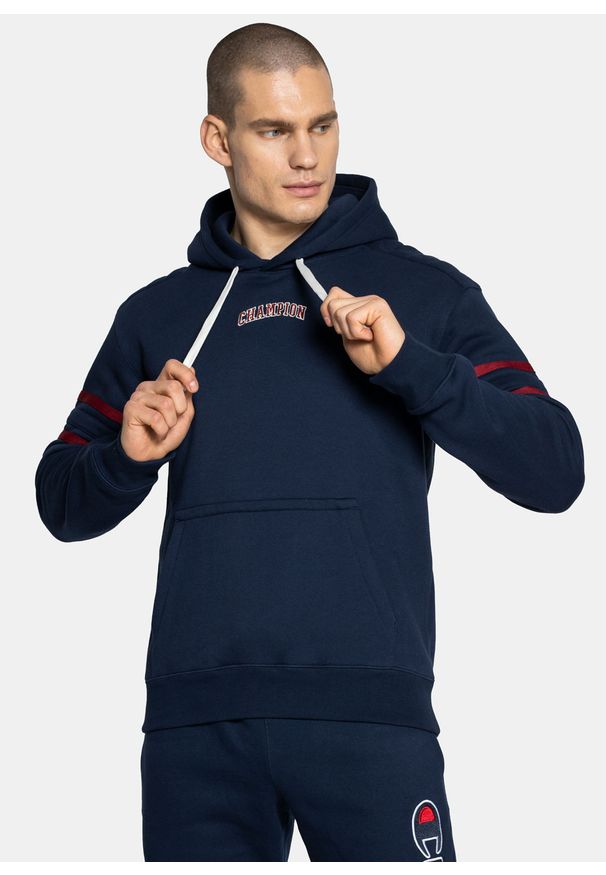 Bluza z kapturem męska granatowa Champion Varsity Script Logo. Typ kołnierza: kaptur. Kolor: niebieski. Materiał: materiał. Styl: elegancki, sportowy