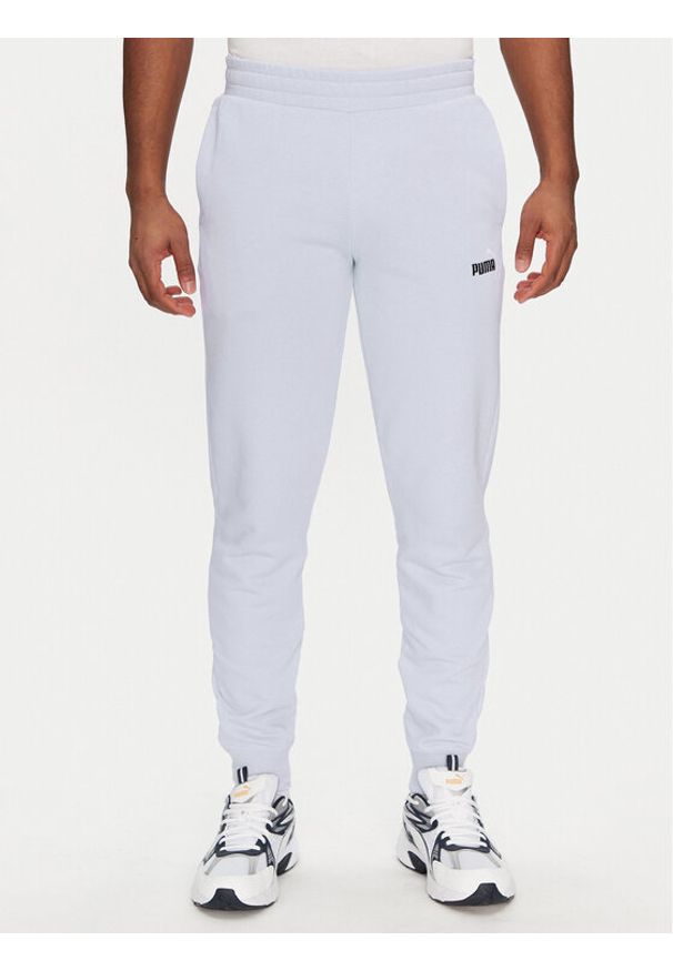 Puma Spodnie dresowe Ess 684714 Fioletowy Regular Fit. Kolor: fioletowy. Materiał: bawełna