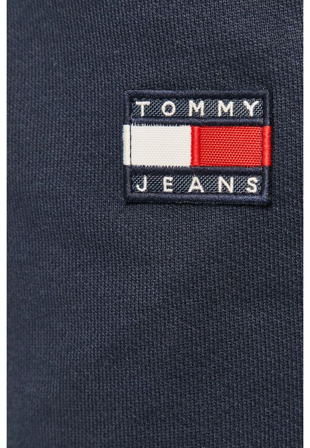 Tommy Jeans - Spodnie. Kolor: niebieski