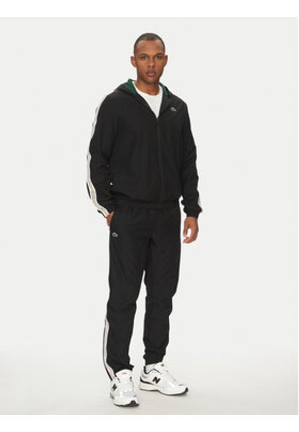 Lacoste Spodnie dresowe XH8974 Czarny Relaxed Fit. Kolor: czarny. Materiał: syntetyk