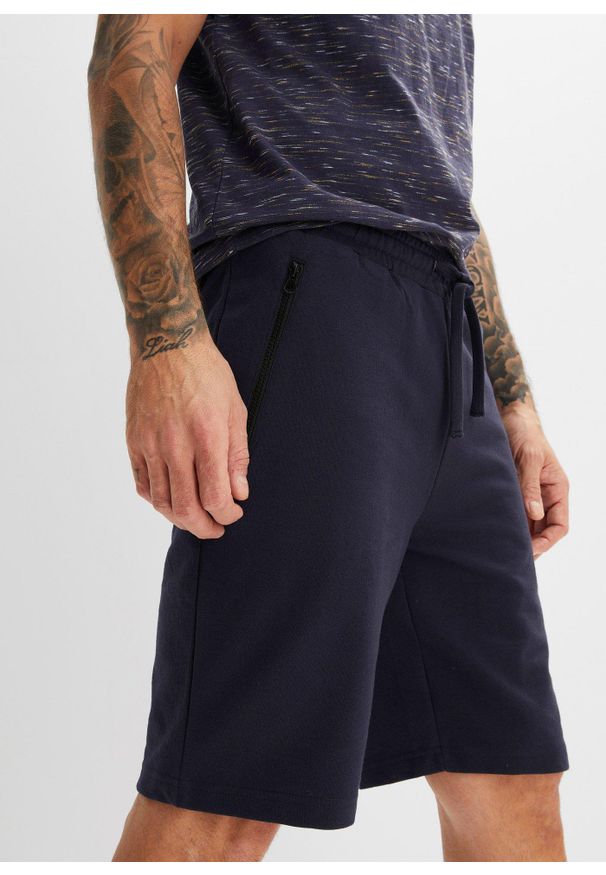 bonprix - Bermudy dresowe z praktycznymi kieszeniami na zamek. Kolor: niebieski. Materiał: dresówka