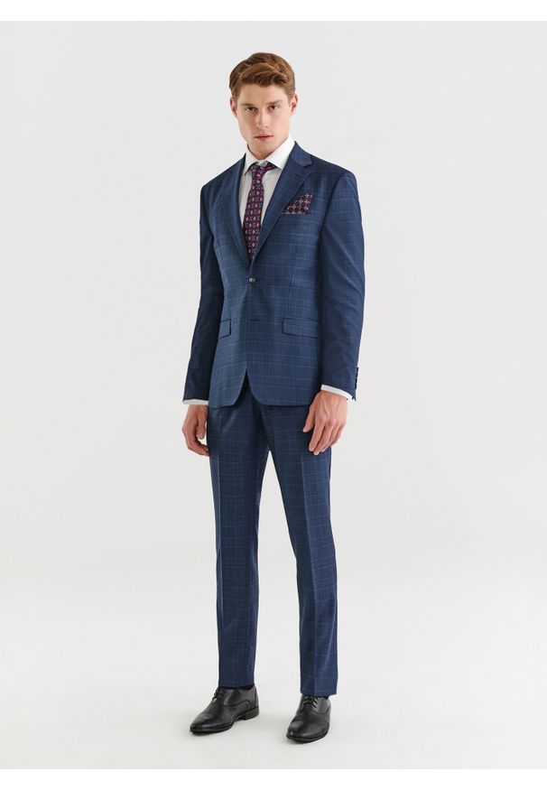 Pako Lorente - PAKO LORENTE – Granatowa marynarka garniturowa w delikatną niebieską kratkę. Okazja: na ślub cywilny, na wesele. Kolor: niebieski. Materiał: wełna. Wzór: kratka. Styl: elegancki