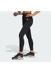 Adidas - Legginsy 7/8 bez szwu z przodu Optime Essentials. Kolor: czarny. Technologia: ClimaCool (Adidas). Wzór: gładki. Sport: fitness