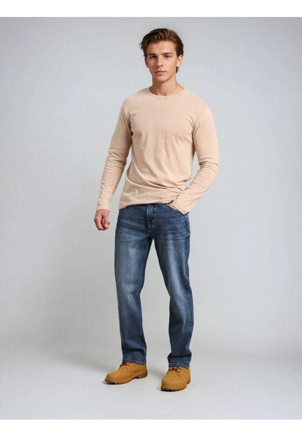 Sinsay - Jeansy straight z efektem sprania - granatowy. Kolor: niebieski