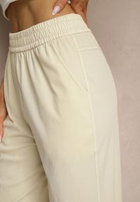 Renee - Beżowe Szerokie Spodnie High Waist z Wiskozą Linowena. Okazja: na co dzień. Stan: podwyższony. Kolor: beżowy. Materiał: wiskoza. Styl: elegancki, casual