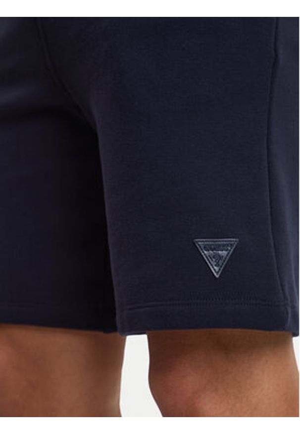 Guess Szorty sportowe M6GD12 K3020 Granatowy Slim Fit. Kolor: niebieski. Materiał: bawełna. Styl: sportowy