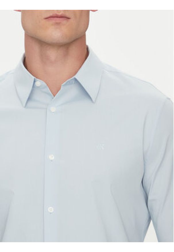 Calvin Klein Koszula LV04LB145G Błękitny Slim Fit. Kolor: niebieski. Materiał: bawełna