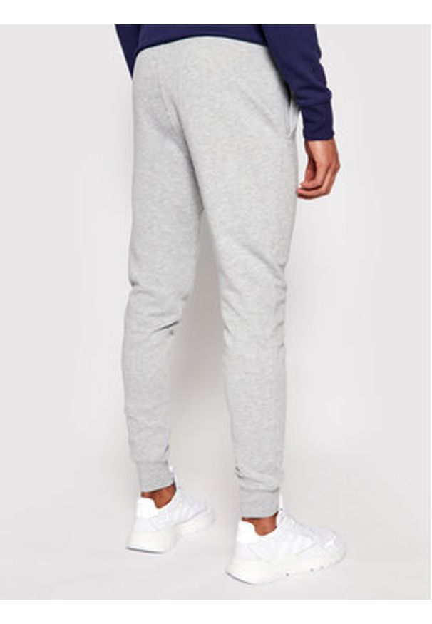 New Balance Spodnie dresowe C C F Pant MP03904 Szary Athletic Fit. Kolor: szary. Materiał: dresówka, bawełna