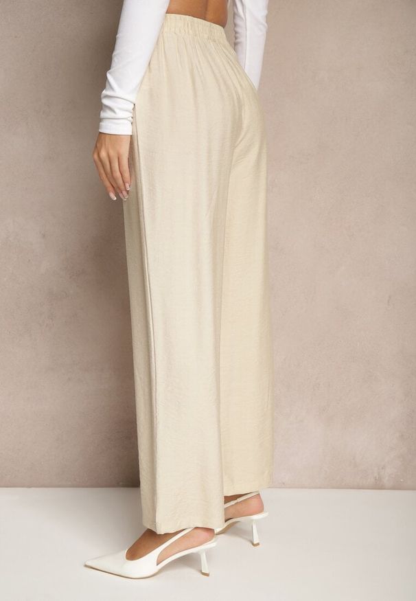 Renee - Beżowe Spodnie o Szerokim Kroju High Waist z Wiązaniem Fenalin. Okazja: na co dzień, na imprezę, na spacer. Stan: podwyższony. Kolor: beżowy. Styl: elegancki, casual