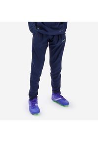 KIPSTA - Spodnie piłkarskie dla dzieci Kipsta Viralto Alpha. Okazja: na co dzień. Kolor: wielokolorowy, zielony, niebieski, fioletowy. Materiał: elastan, poliester, materiał. Styl: casual
