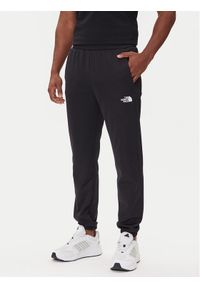 The North Face Spodnie dresowe Reaxion 2.0 NF0A8DRS Czarny Regular Fit. Kolor: czarny. Materiał: syntetyk