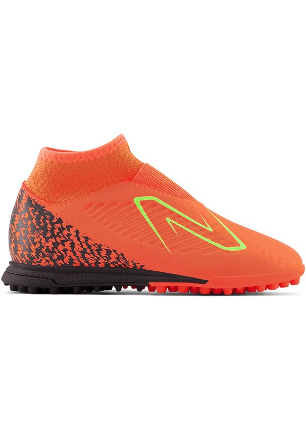 Turfy dziecięce New Balance TEKELA V4 MAGIQUE JNR FG SJT3TDF4 – pomarańczowe. Kolor: pomarańczowy. Materiał: materiał, syntetyk. Szerokość cholewki: normalna. Sezon: zima. Sport: piłka nożna
