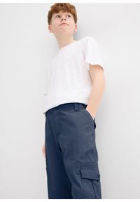 bonprix - Spodnie chłopięce 3/4 o luźnym kroju z czystej bawełny. Kolor: niebieski. Materiał: bawełna #2