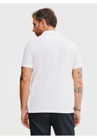 Pako Lorente - PAKO LORENTE – Gładki t-shirt polo w białym kolorze. Okazja: na co dzień. Typ kołnierza: polo. Kolor: biały, pomarańczowy. Materiał: bawełna. Wzór: gładki. Styl: casual
