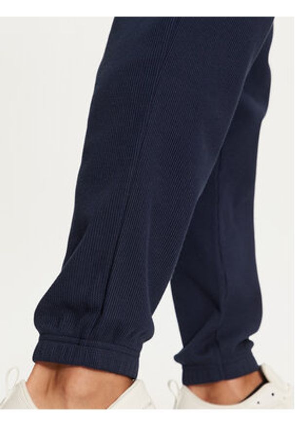 Adidas - adidas Spodnie dresowe Trefoil Essentials IY2305 Granatowy Regular Fit. Kolor: niebieski. Materiał: bawełna, syntetyk