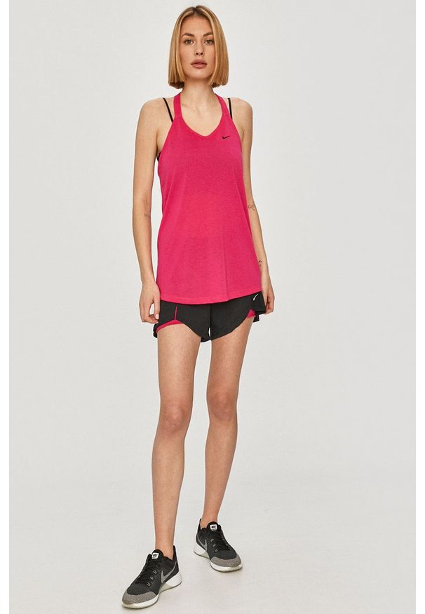 Nike - Top. Kolor: różowy. Materiał: tkanina, dzianina, skóra, włókno