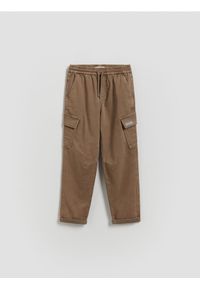 Reserved - Elastyczne spodnie - beżowy. Kolor: beżowy. Materiał: bawełna, włókno, tkanina