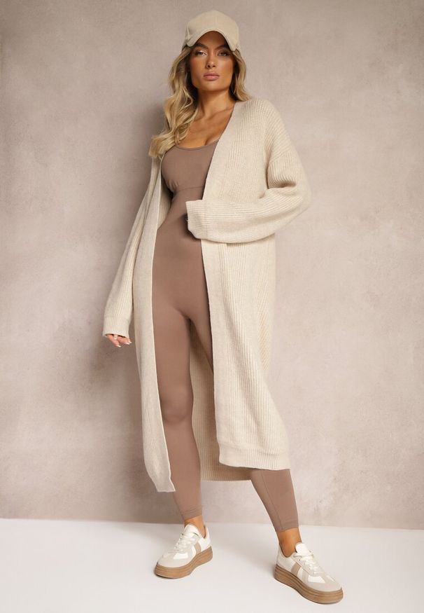 Renee - Beżowy Nierozpinany Casualowy Kardigan o Długim Kroju Ozdobiony Ściągaczami Arfilia. Okazja: na co dzień. Kolor: beżowy. Materiał: jeans. Długość: długie. Wzór: aplikacja. Styl: casual